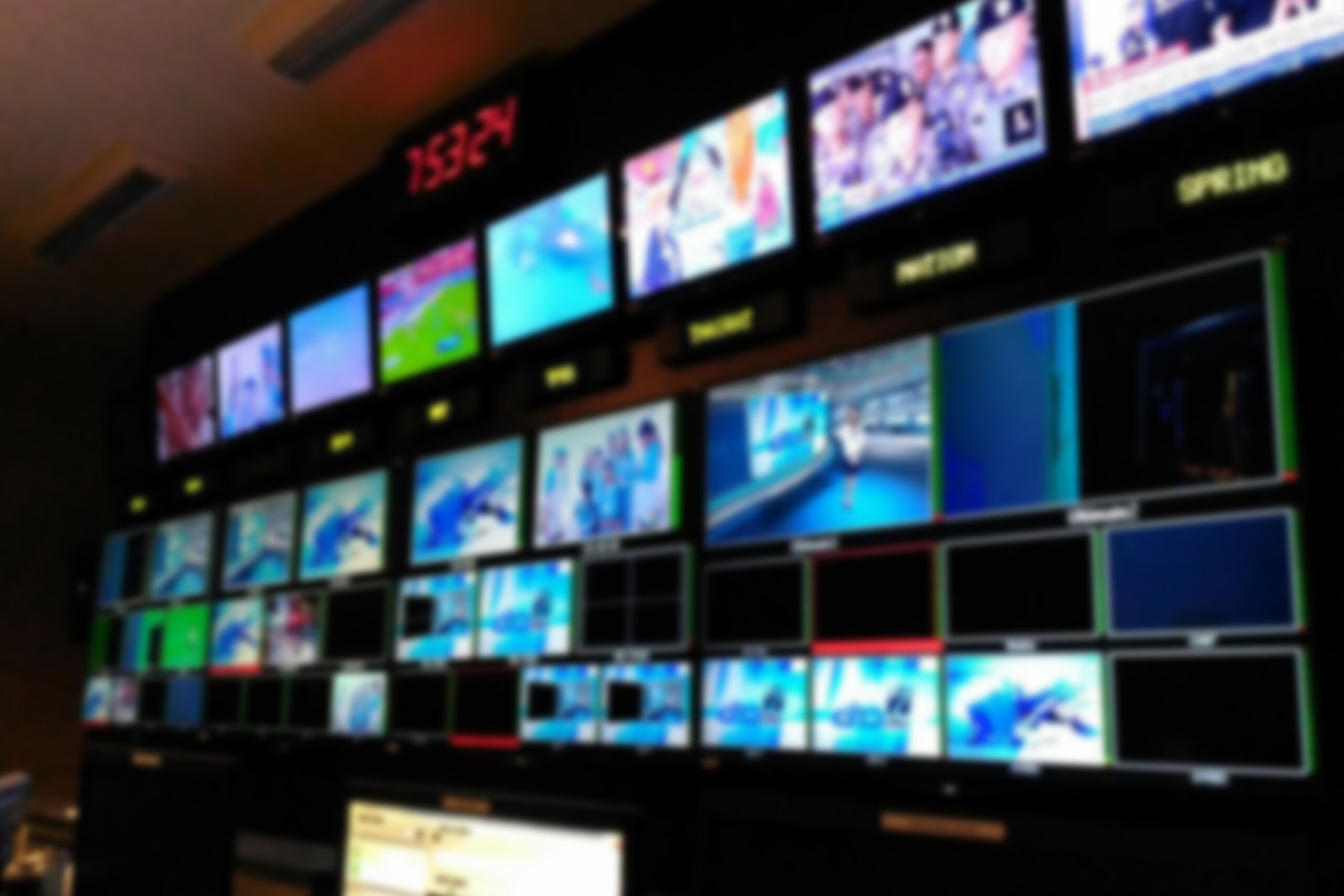 Blurred picture video switch of Television Broadcast, working with video and audio mixer, control broadcasts in recording studio.